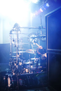 Man playing drums at rock concert