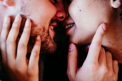 Close-up of young couple kissing