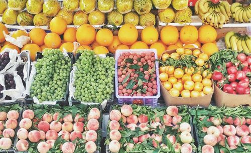 Various fruits for sale at market stall