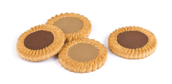 Close-up of cookies against white background