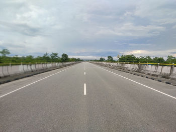 Surface level of road against sky