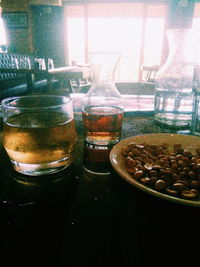 Close-up of beer glass on table
