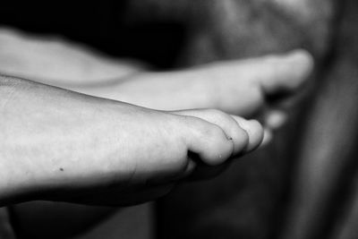 Close-up of woman holding hands