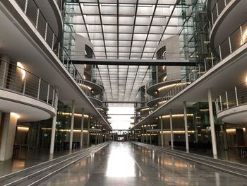Illuminated corridor of modern building