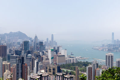 High angle view of buildings against sky in city