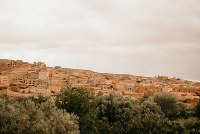 Buildings in city against sky