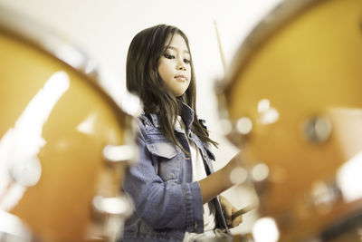 Low angle view of woman standing