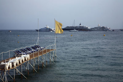 Ship in sea against sky