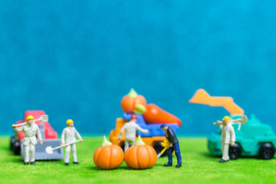 Close-up of multi colored figurines and toys on table