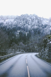 Empty road against sky