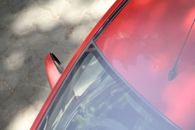 High angle view of reflection of car in water