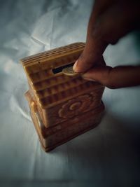 Midsection of person holding umbrella