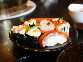 Close-up of sushi served in plate on table