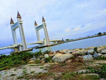 View of bridge over sea against sky