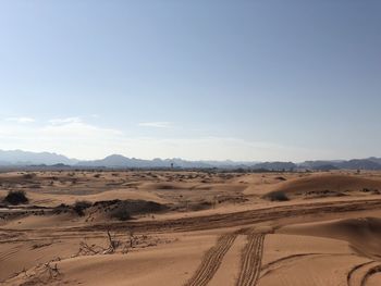 Scenic view of desert against sky