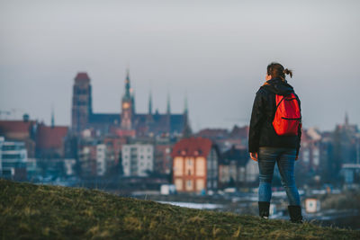 Full length of woman with backpack