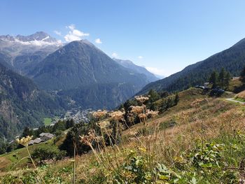 Scenic view of landscape and mountains against sky