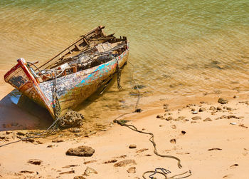 High angle view of abandoned boat at beach