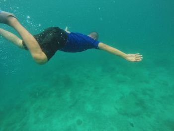 Man swimming in sea