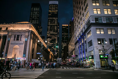 Low angle view of city street at night