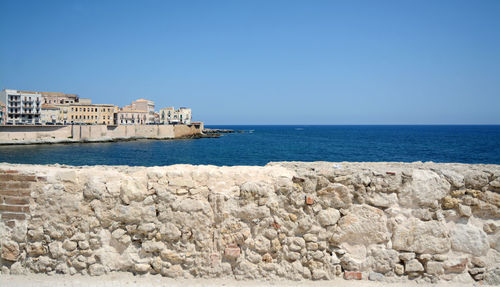 Scenic view of sea against clear sky