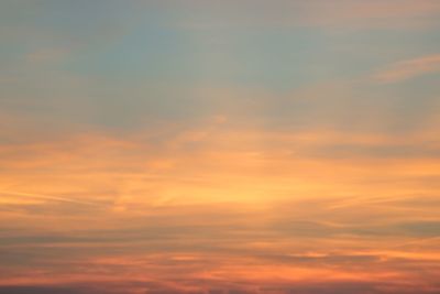 Low angle view of dramatic sky during sunset