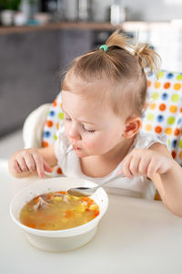 Close-up of boy eating food