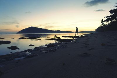 Scenic view of sea at sunset