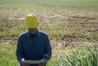 Man standing in field