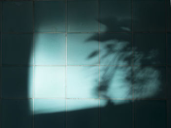 Digital composite image of shadow on wall