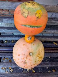 High angle view of pumpkins on wood