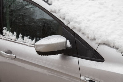 Close-up of car on snow