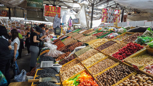 People at market stall