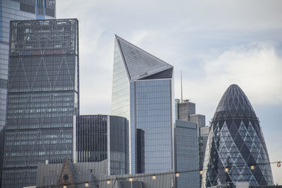 Low angle view of modern buildings against sky
