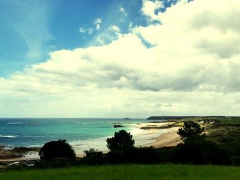 Scenic view of sea and cloudy sky