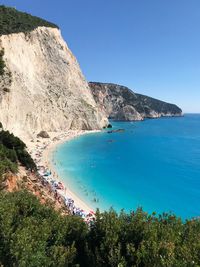 Scenic view of sea against clear blue sky