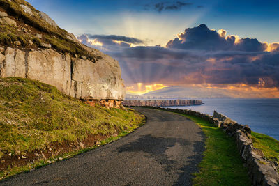 Scenic view of sea against sky during sunset in faroe islands