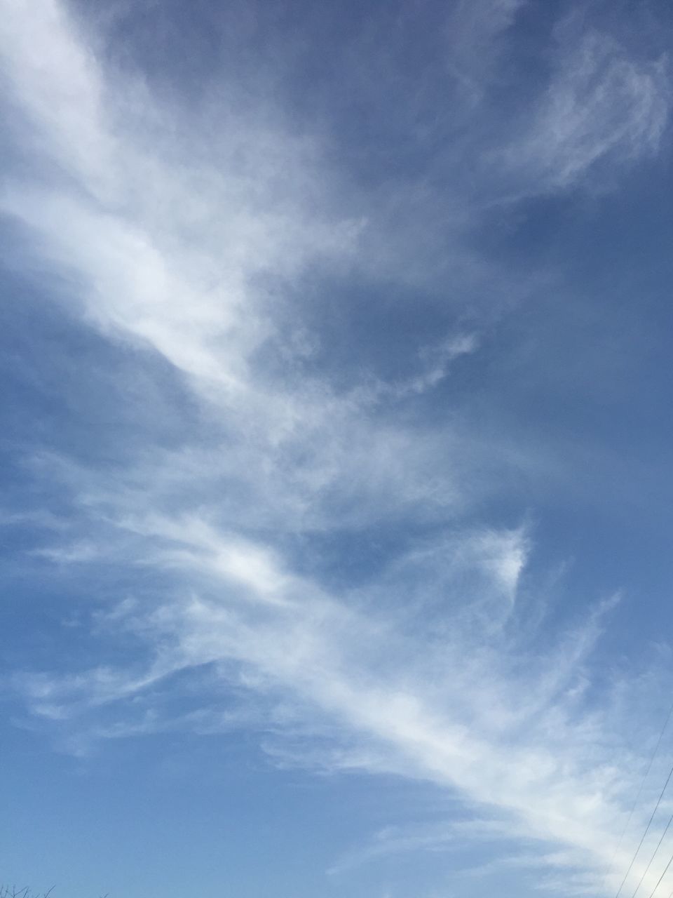 sky, low angle view, cloud - sky, blue, beauty in nature, tranquility, scenics, nature, cloudy, tranquil scene, backgrounds, cloud, sky only, full frame, day, cloudscape, outdoors, idyllic, white color, no people