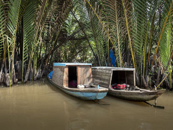 Nautical vessel moored in water