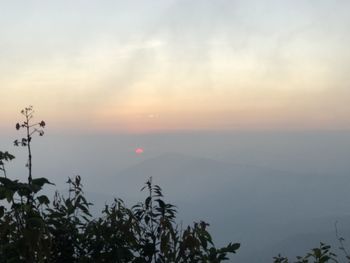 Scenic view of landscape against sky during sunset