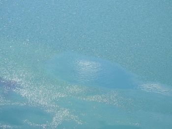 Full frame shot of sea against blue sky