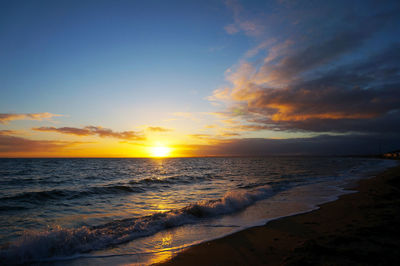 Scenic view of sea against sky during sunset