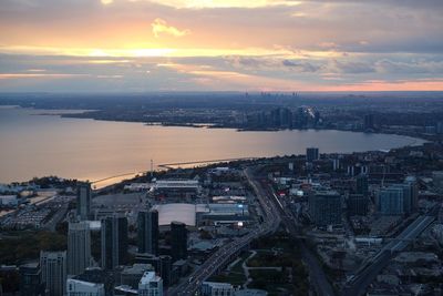 High angle view of buildings against sky during sunset