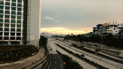 High angle view of street amidst buildings in city