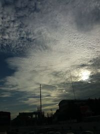 Low angle view of silhouette buildings against sky during sunset