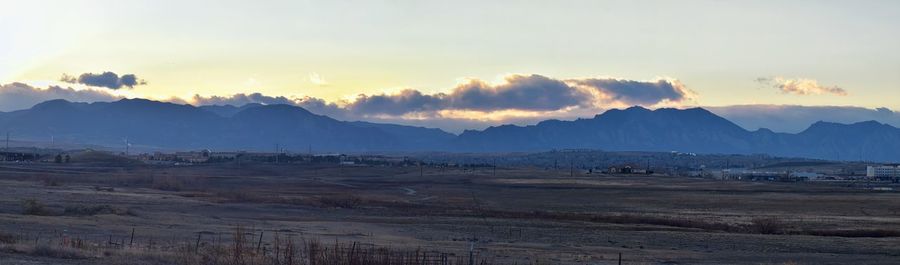 Scenic view of landscape against sky during sunset