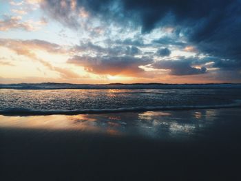 Scenic view of sea at sunset