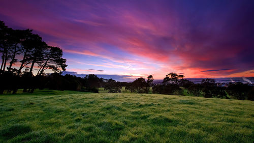 Scenic view of landscape against sky during sunset