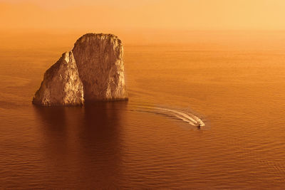 View of calm sea at sunset