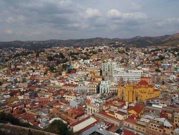 High angle shot of townscape against sky